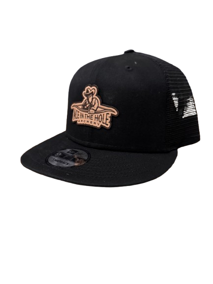 OUTLAW Leather Patch - New Era 9Fifty Trucker Cap - Black/Black